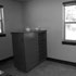 Space for a future free-standing tub - the cabinets hide the water closet